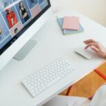 Business owner comparing cheap website design quotes