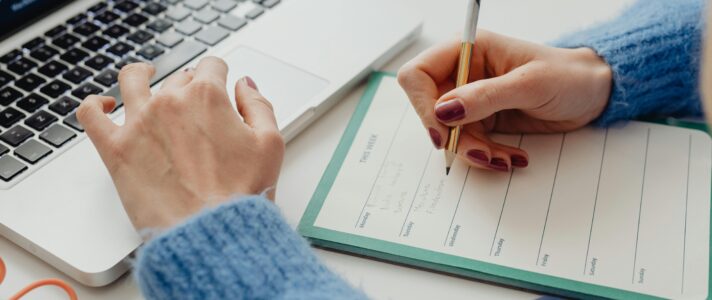 Small business owner working with website developers on laptop
