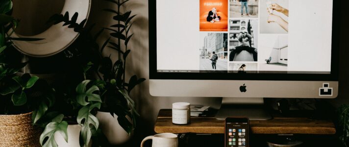 Founder reviewing first business website with web designer
