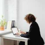 Website designer reviewing call-to-action strategy for small business site