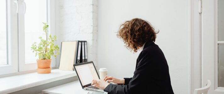Website designer reviewing call-to-action strategy for small business site