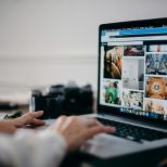 Website designers discussing layout changes for a small business website refresh